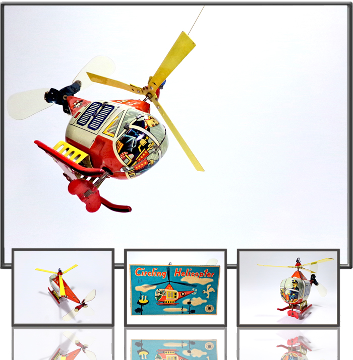 Antique Tin  Airplane Toy H-2 Helicopter. Hangs on a rope. Flies in circles by propeller on the rear Made by Modern Toys, Japan, 1960th