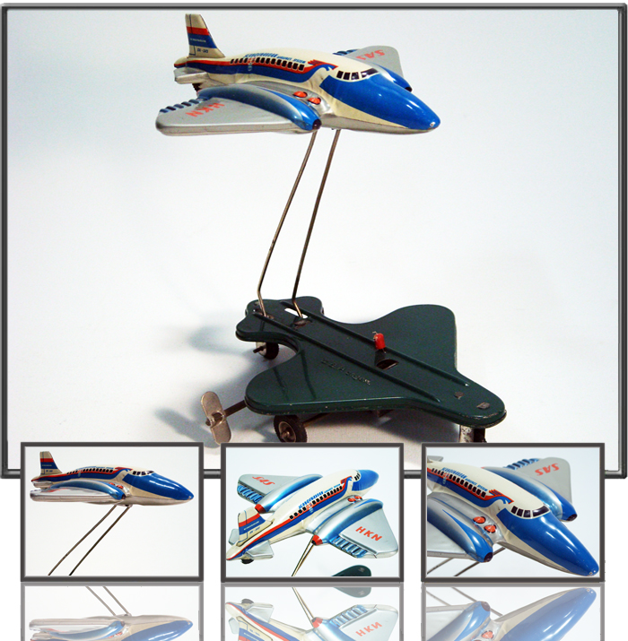 Antique Tin  Airplane Toy SAS airliner. Runs and lifts off from a shade-like platform Made by HUKI, Western Germany,1960th